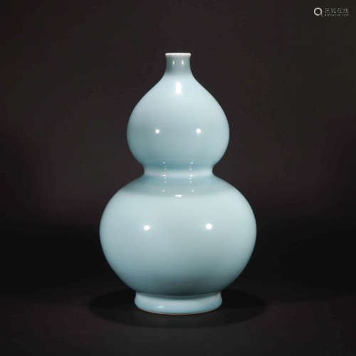 A CHINESE SKYBLUE GLAZED PORCELAIN GOU…