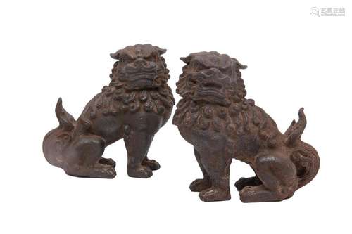 PAIR OF CAST IRON OKIMONO WITH KARASHISHI EFFIGY \n…