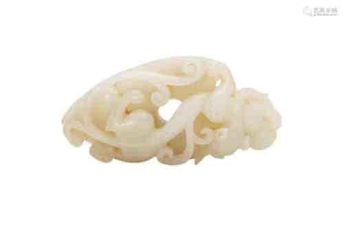 A RUSSET ACCENTS WHITE JADE CARVING OF A CHI DRAGO…