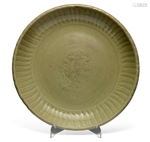 A Chinese heavy longquan celadon pottery dish, centre with peony surrounded by moulded ribs and pie crust rim. Ming 15th century. Diam. 31 cm.