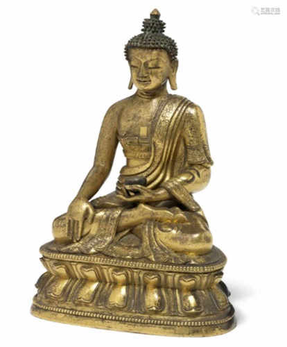 A Chinese gilt bronze figure of Buddha Shakyamuni. Qianlong 1736-1795. Weight 2912 g. H. 23 cm.