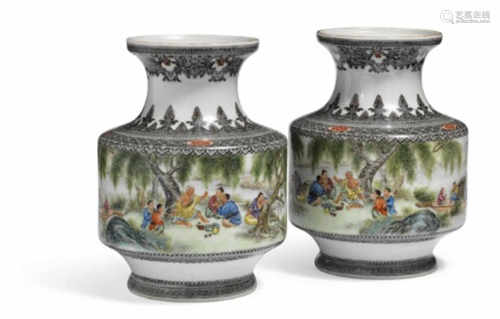 A pair of Chinese porcelain vases decorated in colours with a luncheon on the riverbank. Mark of Jian Gu. 1950. H. 16.5 cm. (2)