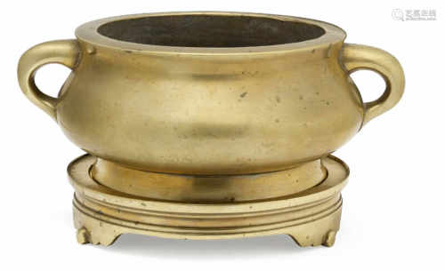 A Chinese bombé-shaped bronze censer and matching tripod base. Xuande six-character mark but 19th century. Weight 3099 g. Diam. 17 cm.