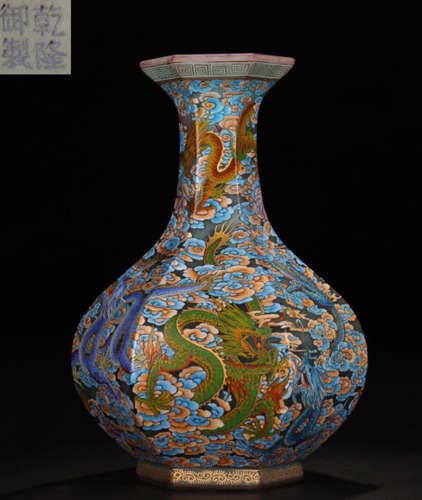 A BLUE GLASS AND ENAMELED GLAZE VASE CARVED WITH SEVEN DRAGONS