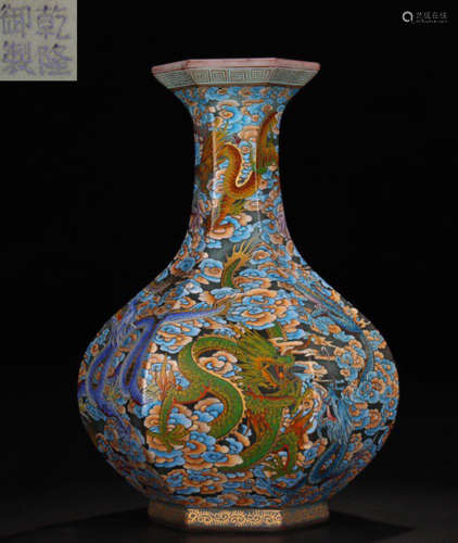 A BLUE GLASS AND ENAMELED GLAZE VASE CARVED WITH SEVEN DRAGONS
