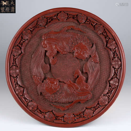 A LACQUER CARVED LION PATTERN PLATE