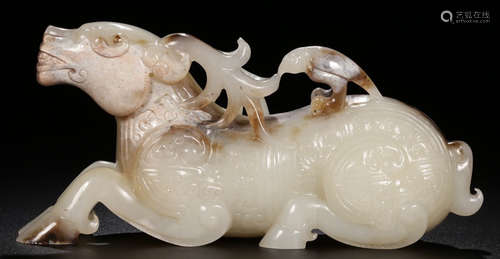 A XINJIANG HETIAN JADE BEAST SHAPE PENDANT