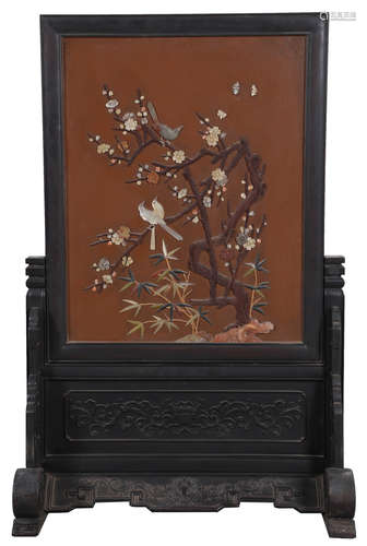 A LACQUER AND ZITAN WOOD SCREEN EMBEDED WITH GEMS CARVED WITH PLUM TREE