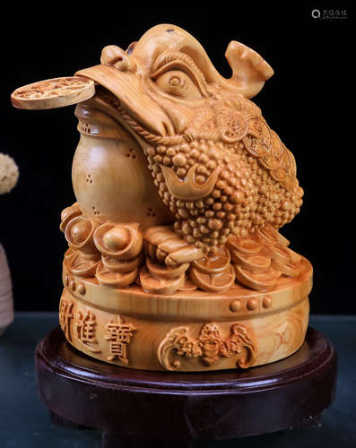 A YABAI WOOD CARVED BEAST SHAPED ORNAMENT