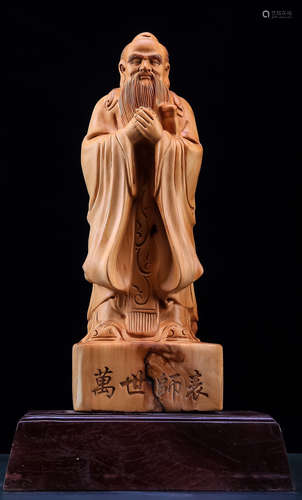 A YABAI WOOD CARVED CONFUCIUS SHAPED STATUE