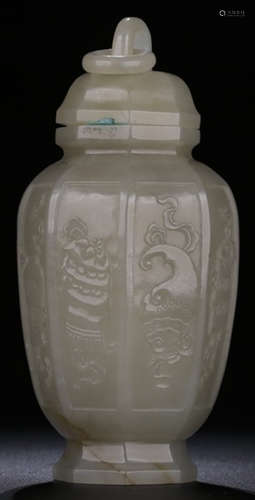 A HETIAN JADE CARVED AUSPICIOUS PATTERN VASE