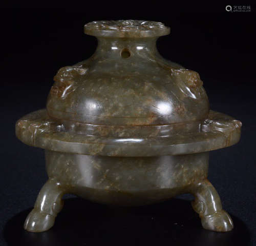 AN ANTIQUE JADE TRIPOD CENSER