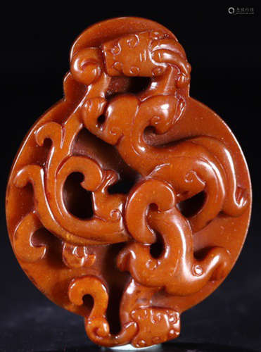 A YELLOW JADE PENDANT CARVED WITH DRAGON PATTERN