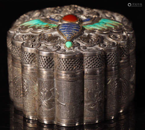 A SILVER BOX CARVED WITH AUSPICIOUS PATTERN