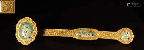 A GILT BRONZE CARVED RUIYI EMBEDED WITH GEMS