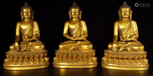 A GILT BRONZE CARVED BUDDHA