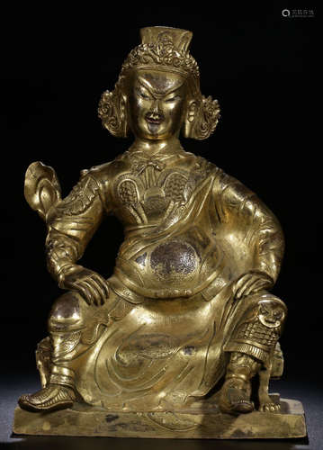 A GILT BRONZE WEN CAISHEN BUDDHA STATUE