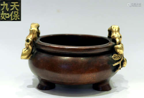 A GILT BRONZE CARVED TRIPOD CENSER