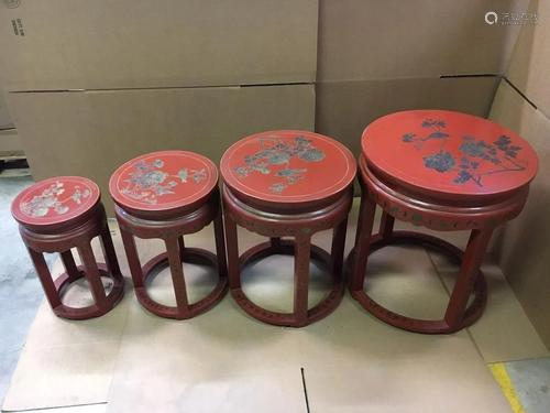 A Set Of Four Lacquered Circular Stools