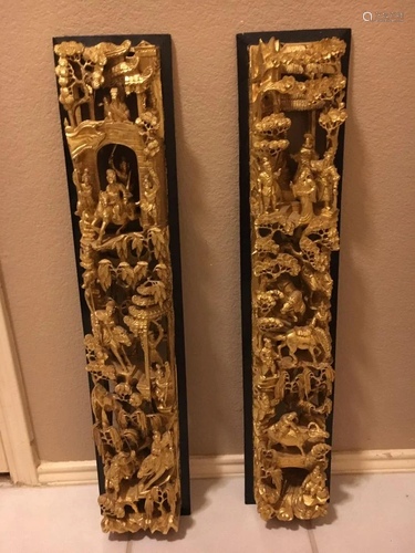 A Pair Of Gilt Lacquered Wooden Panels