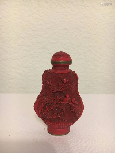 A Red Lacquered Snuff Bottle