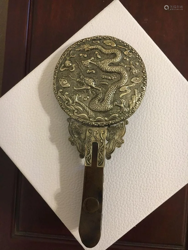 A Gilt Silver Mirror And Dark Yellow Jade Hook