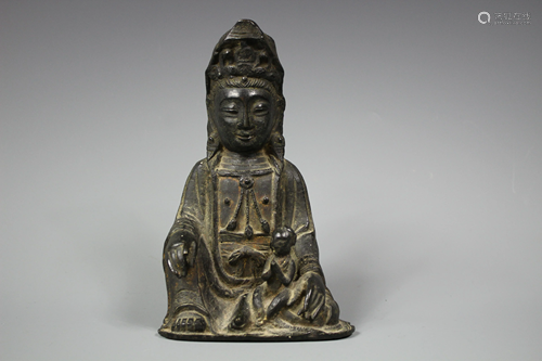 A Bronze Figure of Guanyin Seated, Ming Dy…