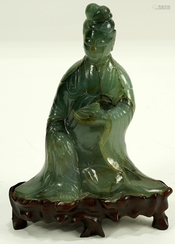 A Chinese Hardstone Guanyin, a seated Guanyi…