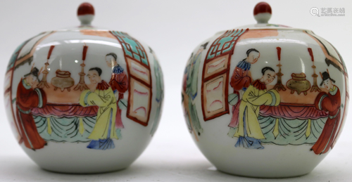 A pair of Chinese famille-rose lidded Jars