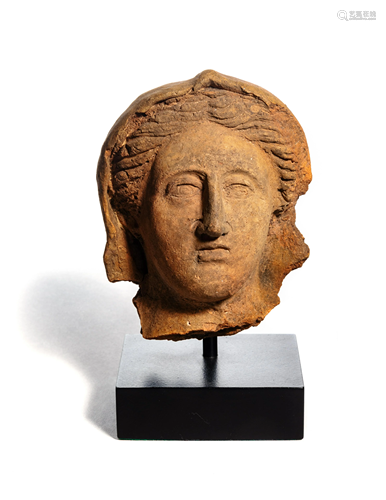 An Etruscan Terra Cotta Votive Head of a …