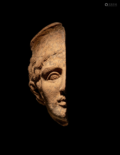 An Etruscan Terra Cotta Votive Half Head