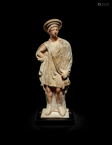 A Greek Painted Terra Cotta Male Figure