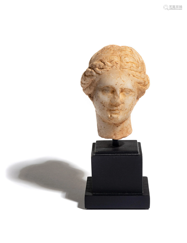 A Greek Marble Head of Aphrodite Height…