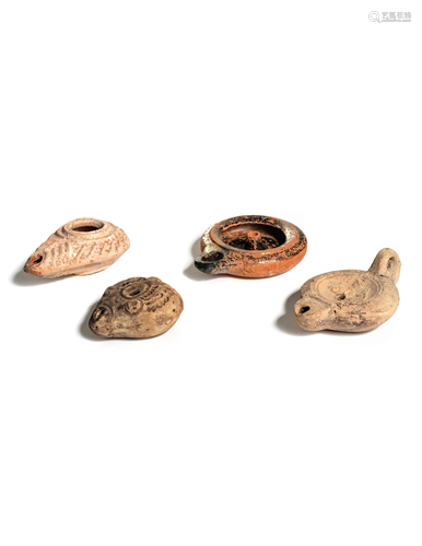 Four Roman Molded Terra Cotta Oil Lamps Wid…