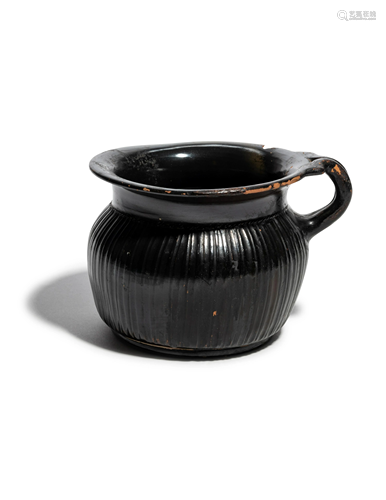 A Greek Black-Glazed Ribbed Mug