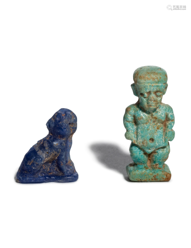 An Egyptian Glass Anubis Amulet and an Eg…
