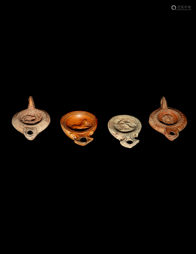 Four Roman Molded Terra Cotta Oil Lamps