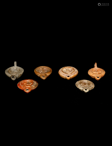 Six Roman Molded Terra Cotta Oil Lamps