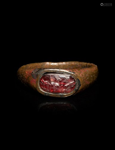 A Roman Bronze and Carnelian Finger Ring