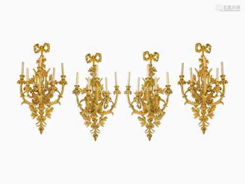 A Set of Four Louis XV Style Gilt-Bronze Five-Li…