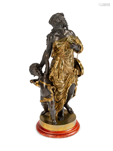 A Parcel-Gilt and Patinated Bronze Large Fig…