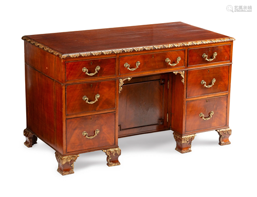 A George III Style Parcel-Gilt Mahogany Kne…