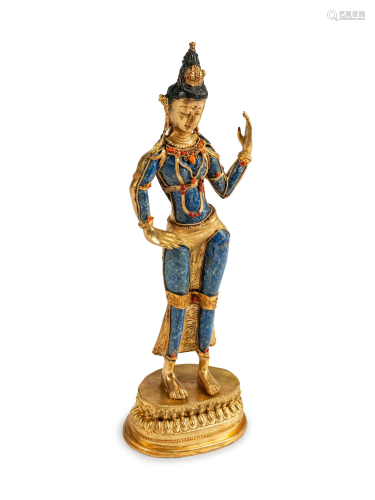 A Tibetan Jeweled Bronze and Sodalite Figur…
