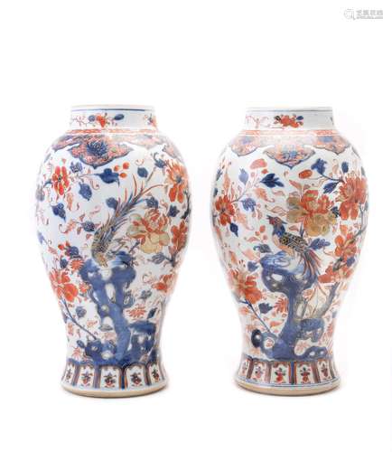 A pair of Chinese Imari slender baluster vases