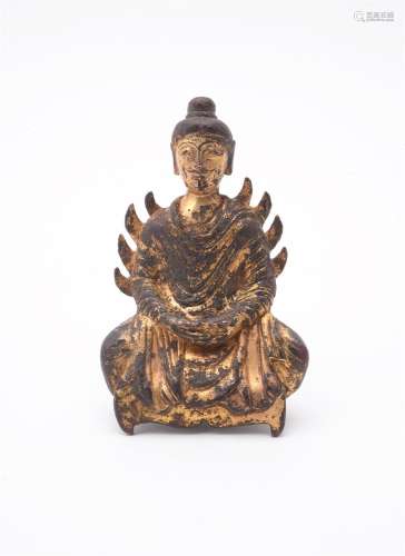 A Chinese gilt bronze figure of seated Buddha