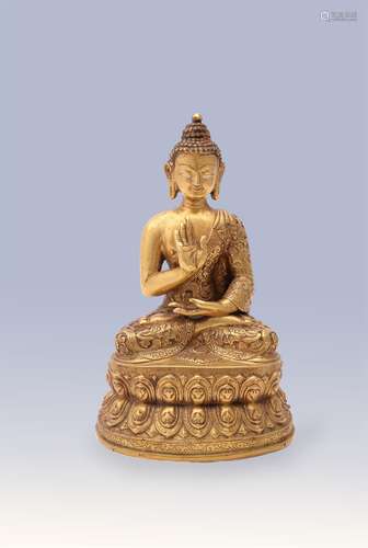 A Sino-Tibetan gilt-bronze Buddha