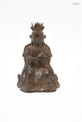 A Chinese seated bronze figure of a Daoist deity