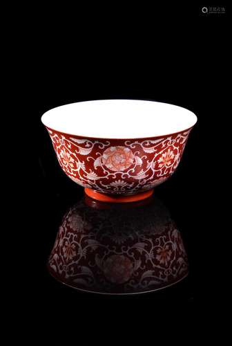 A Chinese coral-ground reserve decorated 'Lotus' bowl