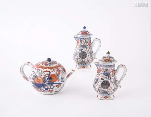 A pair of Chinese hexagonal 'Imari' cream jugs and covers