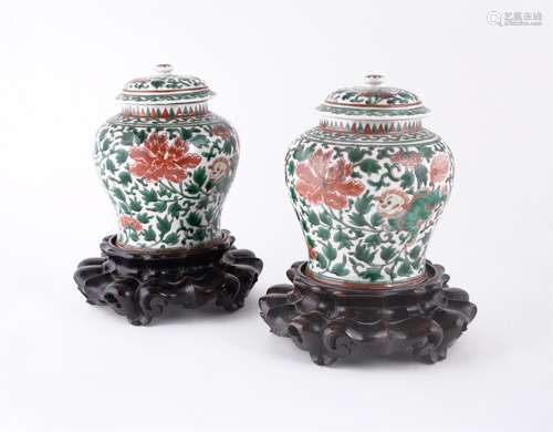 A pair of Chinese 'Famille Verte' vases and covers